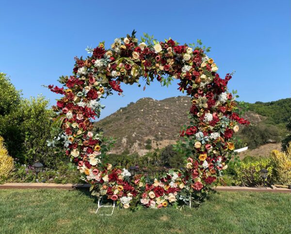 Burgundy Circle Wedding Arch Flowers